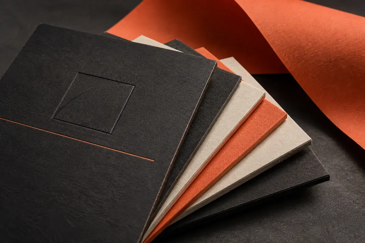 Illustrative paper texture and metallic finishing detail