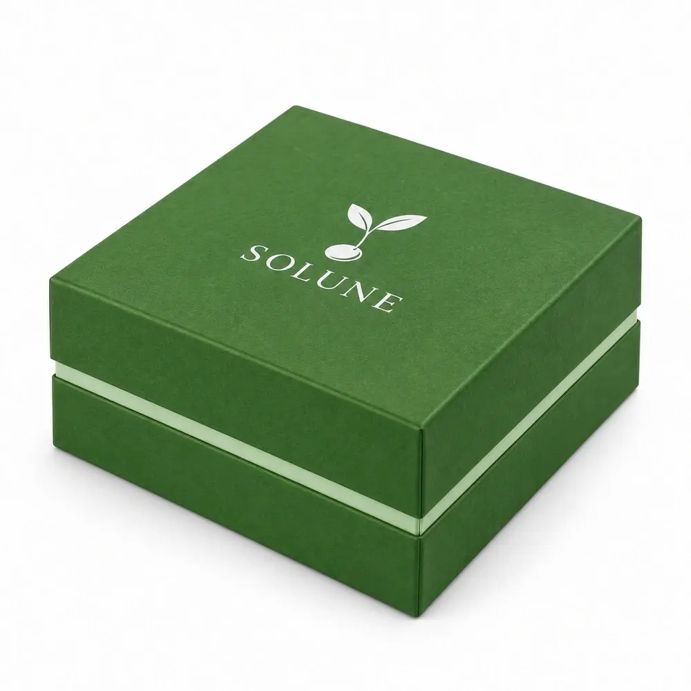 Alternate view of the grass green with pale mint accents shoulder presentation boxes with SOLUNE artwork