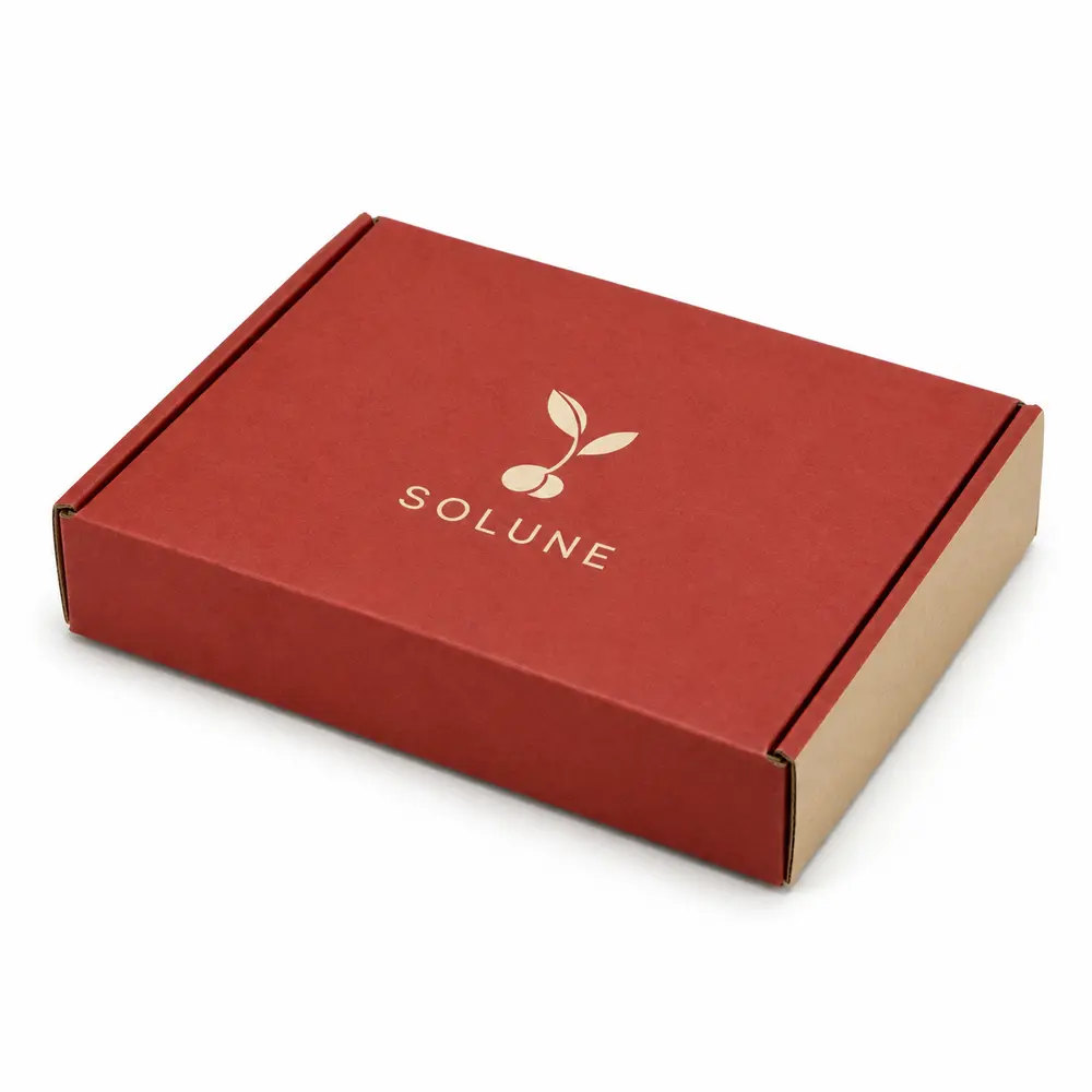 Alternate view of the brick red with sand accents side-loading mailers with SOLUNE artwork
