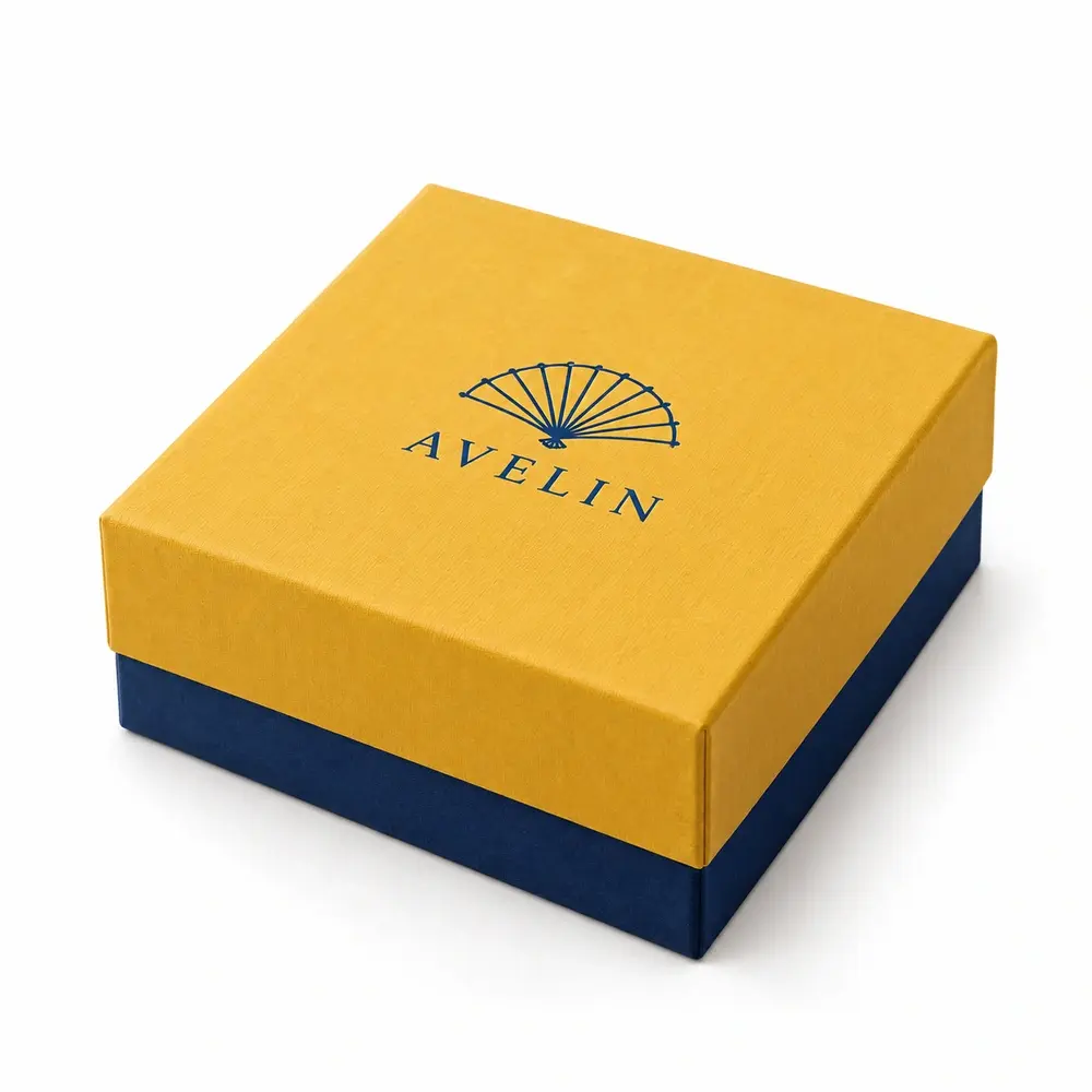 saffron yellow with ink blue accents lid & base boxes with AVELIN logo printing on a white background
