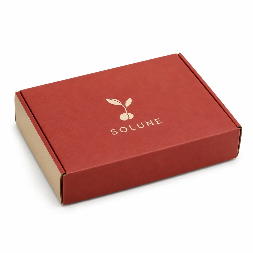brick red with sand accents side-loading mailers with SOLUNE logo printing on a white background