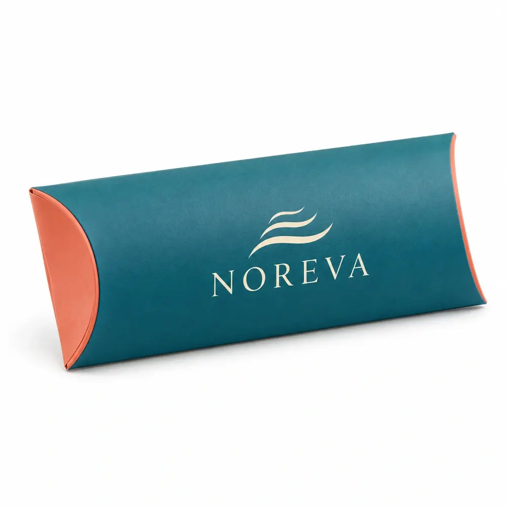 kingfisher teal with coral accents pillow packs with NOREVA logo printing on a white background