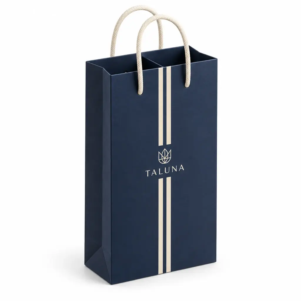 navy and cream wide bottle carrier with paper divider with TALUNA logo printing on a white background