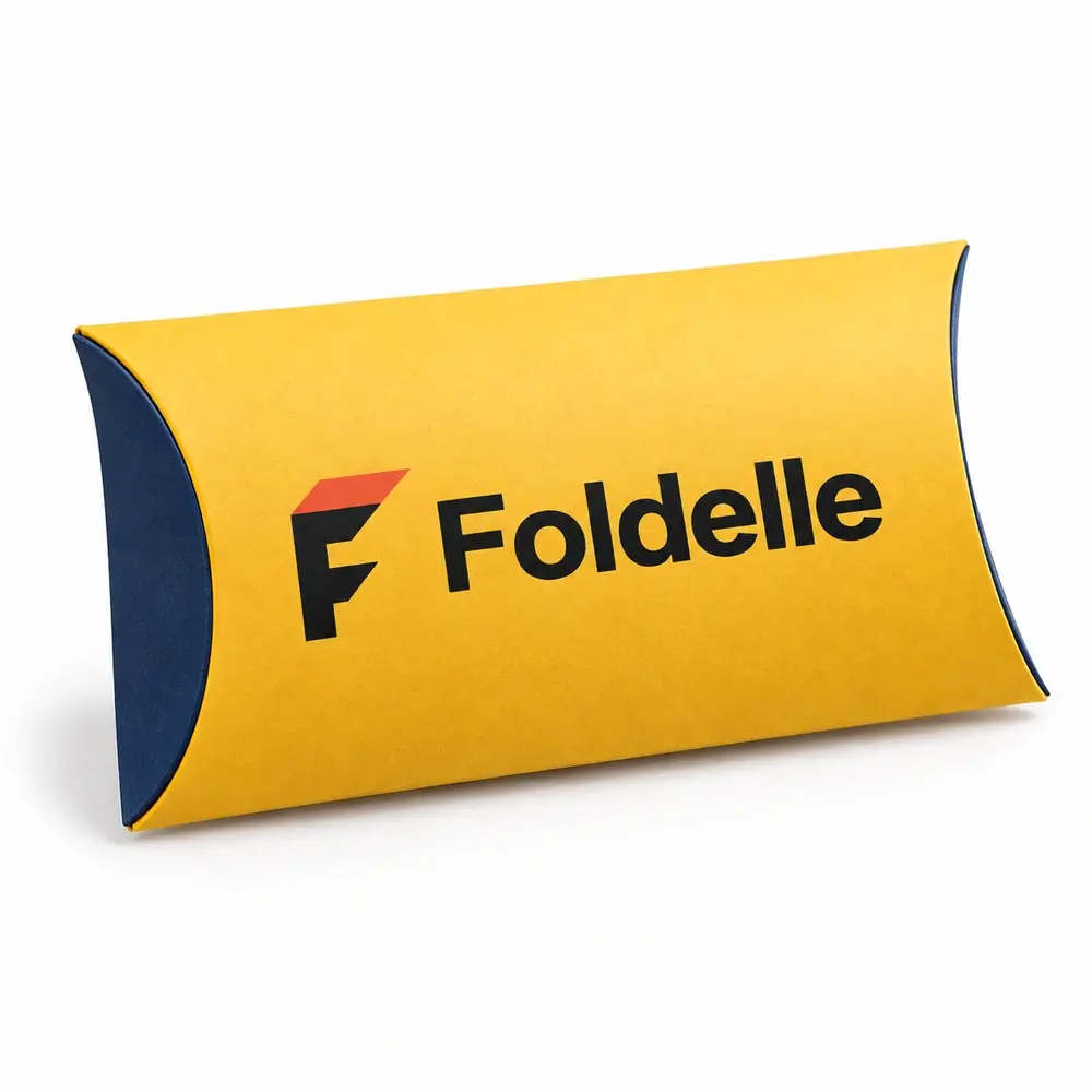 saffron yellow with ink blue accents pillow packs with Foldelle logo printing on a white background