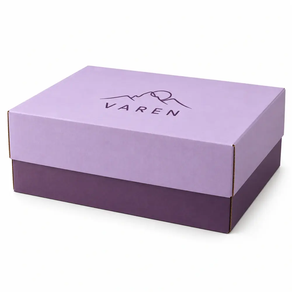 powder lilac with aubergine accents telescoping shipping boxes with VAREN logo printing on a white background