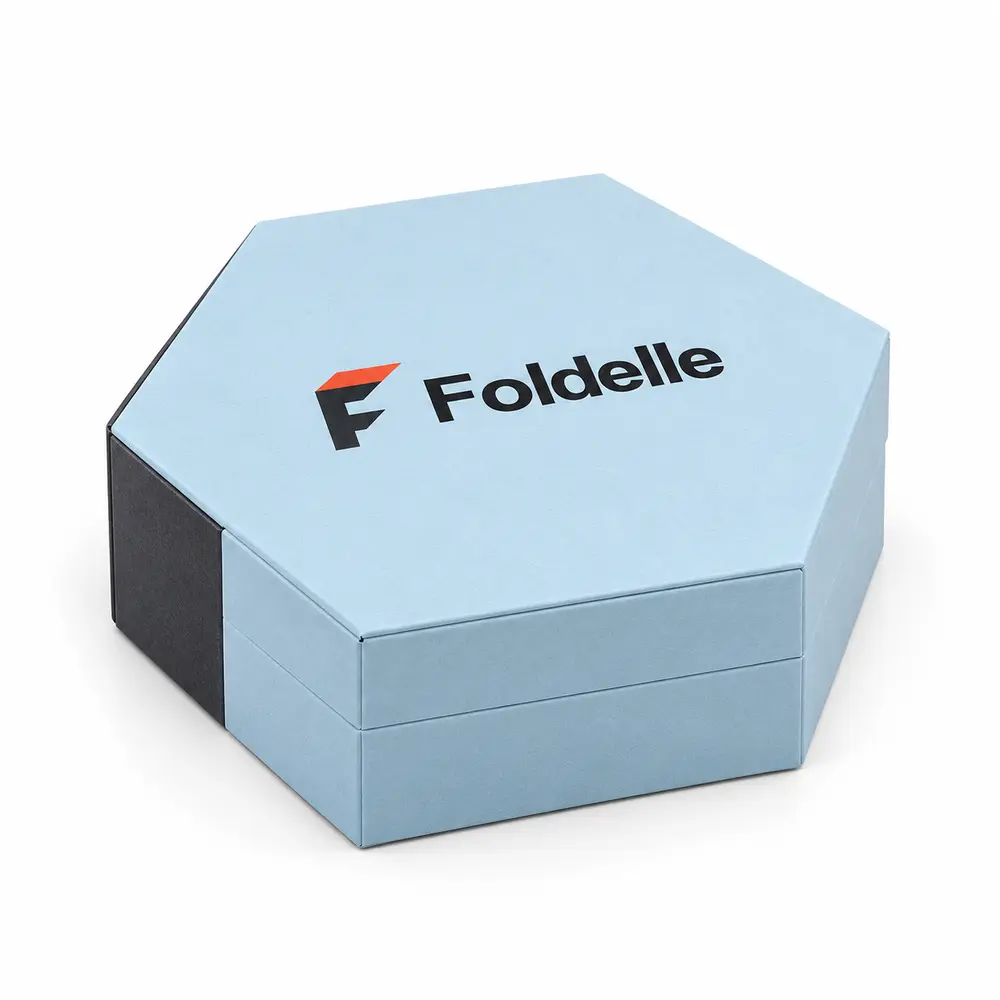 glacier blue with charcoal accents hexagonal magnetic boxes with Foldelle logo printing on a white background
