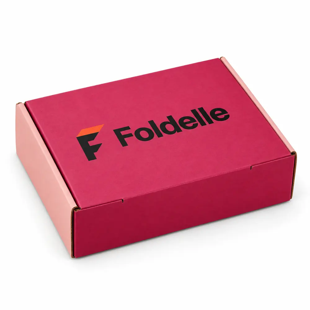 raspberry with blush accents roll-end mailer boxes with Foldelle logo printing on a white background