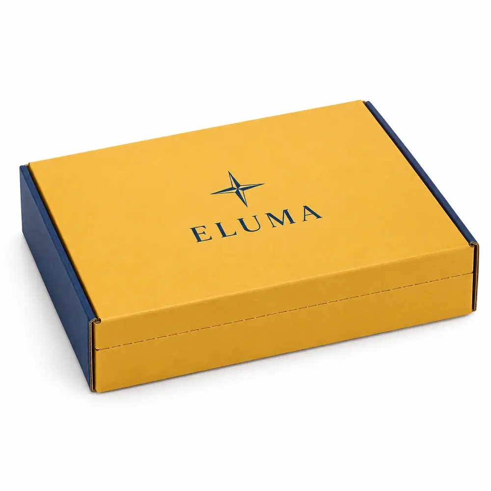 saffron yellow with ink blue accents resealable mailer boxes with ELUMA logo printing on a white background