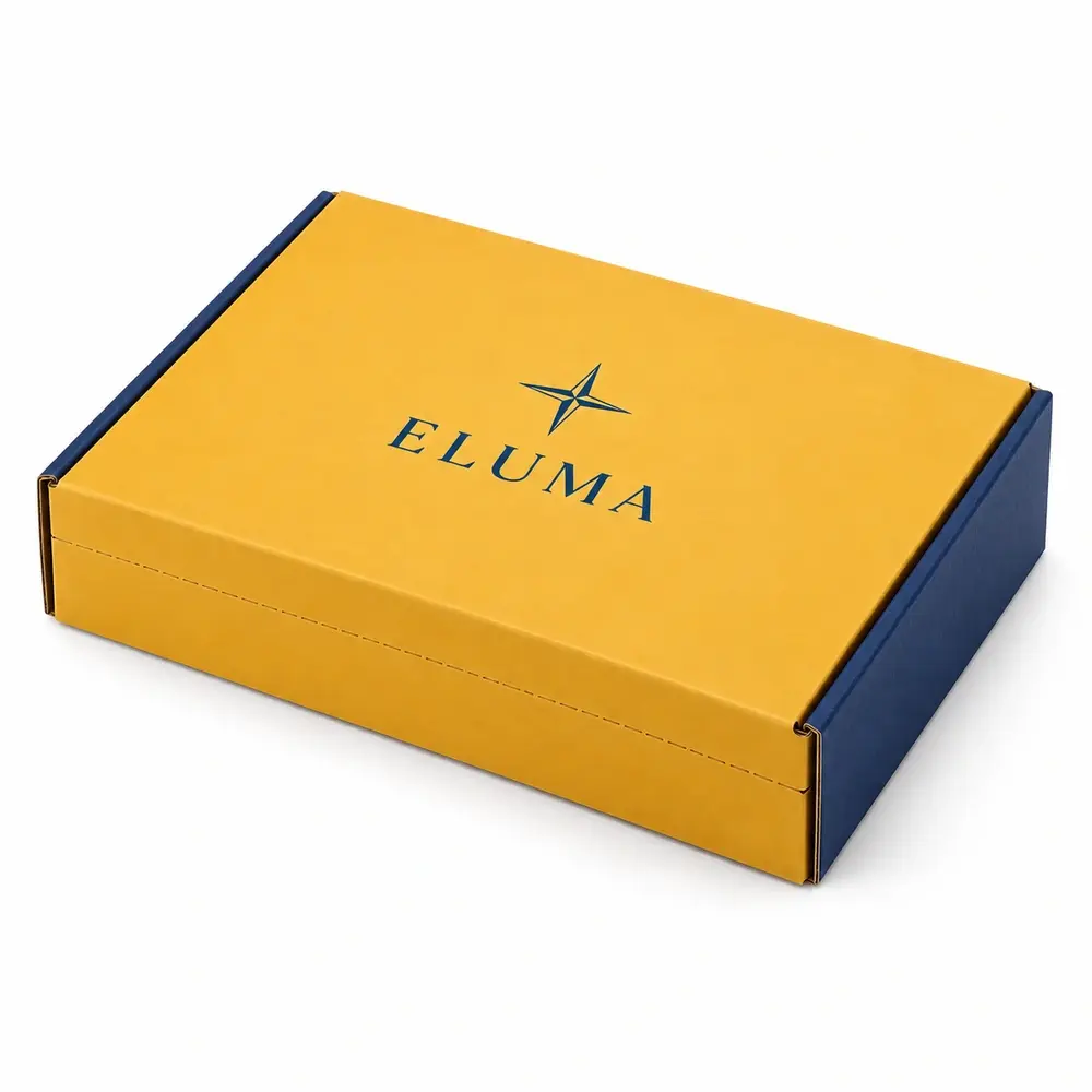 Alternate view of the saffron yellow with ink blue accents resealable mailer boxes with ELUMA artwork
